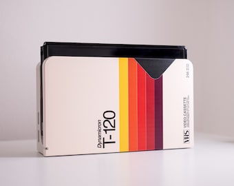 Funda para base de Nintendo Switch con diseño de cinta de vídeo VHS retro