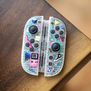 Joy-Cons 2 personalizados estilo "retro de los 90" para Nintendo Switch – Transparentes que brillan en la oscuridad