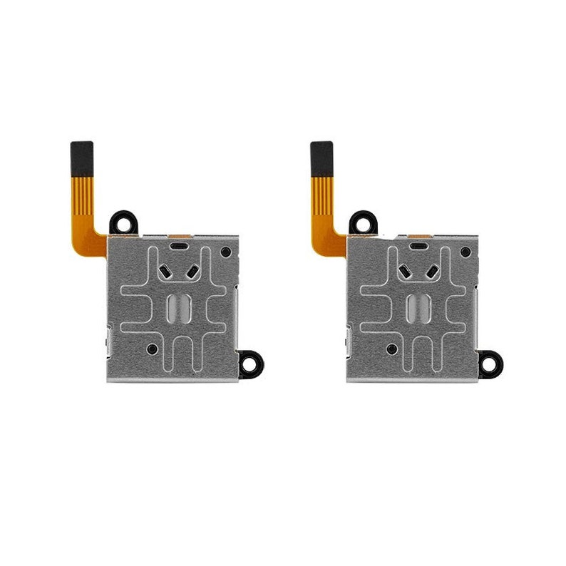 May include: Two silver-colored electronic components with black and orange wires. Each component has a rectangular shape with a grid pattern and multiple small holes.