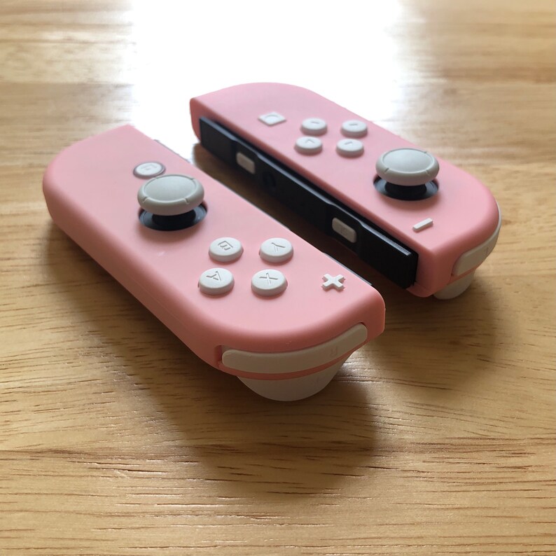 pink nintendo joycons