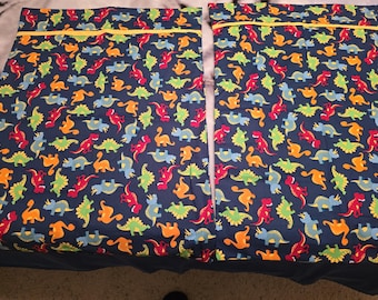 set of dinosaur print pillowcases