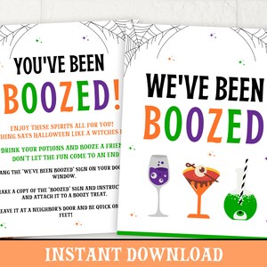 May include: Two printable signs with a Halloween theme. The signs are white with black text and colorful graphics. The text on the signs reads "You've Been Boozed!" and "We've Been Boozed!" The signs feature images of potion bottles, a martini glass, and a cocktail glass.