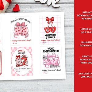 May include: A sheet of Valentine's Day cards with various designs featuring the numbers six and seven. The cards are in pink and red, with phrases like "Friends stick together like" and "You're the 6 to my 7". The text "Happy Valentine's Day!" is also included.