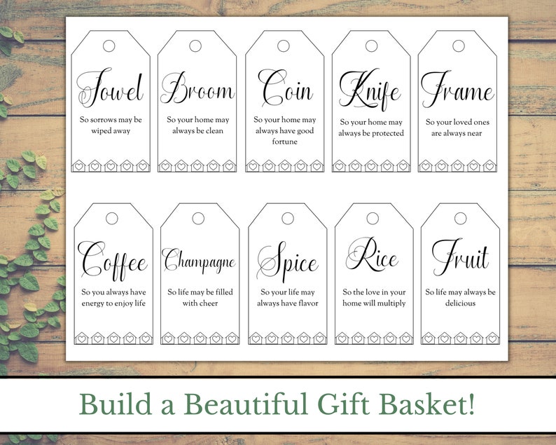 May include: Ten printable gift tags with black text on a white background. Each tag has a different word and a short phrase. The words are: Towel, Broom, Coin, Knife, Frame, Coffee, Champagne, Spice, Rice, and Fruit.
