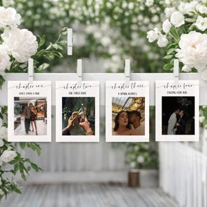 May include: Four photo cards with black text and images are clipped to a white wooden rail. The cards read "Chapter One: Once Upon a Time," "Chapter Two: The First Date," "Chapter Three: A Spark Ignites," and "Chapter Four: Falling for You."