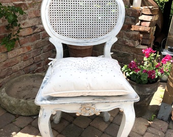 The old chair in louis style painted in shabby chic