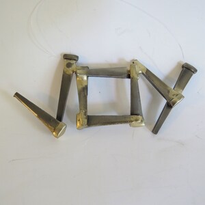 JOY Handmade wall decor wall art of melted brass and steel nails