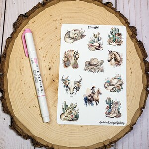 May include: A sheet of stickers with a western theme. The stickers feature a variety of images, including cowboy hats, cacti, boots, a skull, and a horse. The text "Cowgirl" and "Sakura Design Gallery" are printed on the sheet.