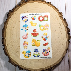 May include: A sheet of stickers featuring gnomes in various summer-themed outfits and accessories. The gnomes are wearing sunglasses, hats, and holding items like watermelon slices, inflatable rings, and pineapples. The text "Pool Party Gnomes" is at the top of the sheet, and the text "Sakura Design Gallery" is at the bottom.