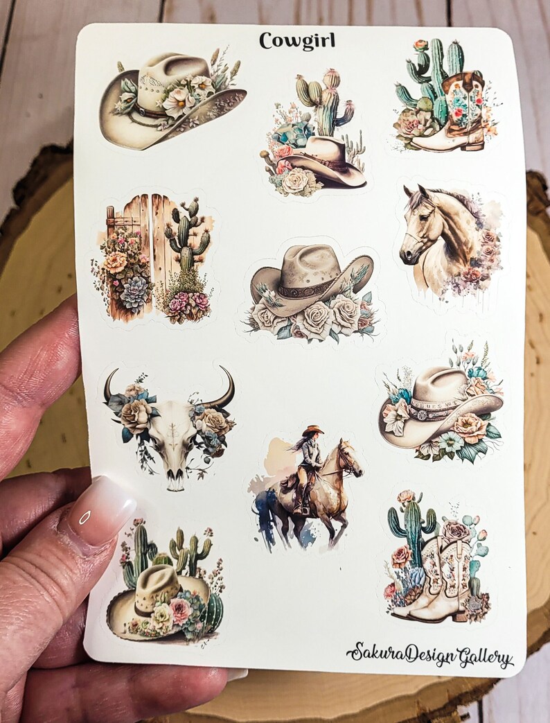 May include: A sheet of 10 colorful stickers featuring a cowgirl theme. The stickers include images of cowboy hats, cacti, boots, a skull, a horse, and a cowgirl riding a horse. The stickers are perfect for adding a touch of western flair to your planner, laptop, or water bottle.