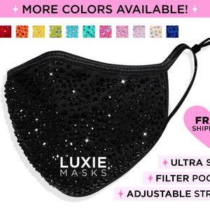 May include: Black face mask with rhinestones and the text "Luxie Masks". The mask has adjustable straps and a filter pocket.  Free shipping is offered.