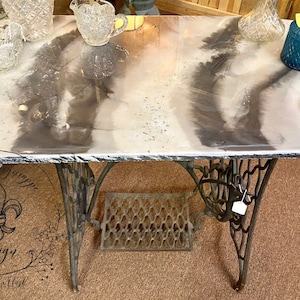 Vintage cast iron sewing machine with brand new epoxy top