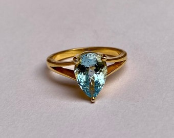 Pear Aquamarine Ring: 2.65 Carat, 18KT Yellow Gold Birthstone Ring