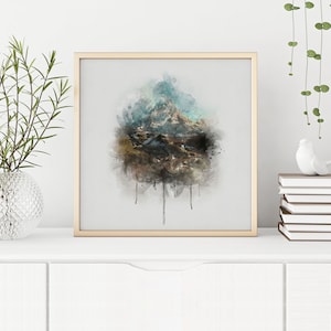 May include: A watercolor painting of a mountain range with a blue and green sky. The painting is framed in a light wood frame.