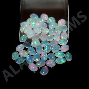Cabochon di opale etiope di migliore qualità, pietra preziosa naturale multifuoco di forma ovale, dimensioni 7 x 5 mm, per la creazione di gioielli.