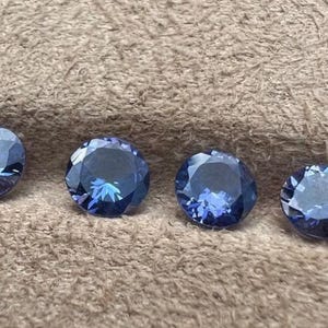 Natural Tanzanite AA Color Round Shape Loose Gemstone faceted Cut Stone, Calibrated, 2 mm, 3 mm, 4 mm, 5 mm. Size Tanzanite gemstone.