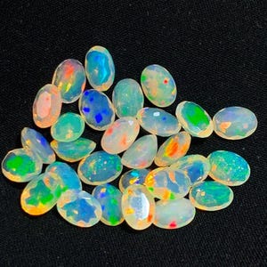 AAA++ Opale etiope tagliato pietra preziosa sciolta Lotto di opali Opale etiope tagliato Pietra preziosa Lotto di opali Pietra preziosa di alta qualità tagliata opale fuoco appariscente multi.