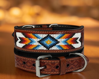 May include: Two brown leather dog collars. The top collar features a beaded design with white, blue, orange, and red colors. The bottom collar has a stamped pattern and a silver buckle. The collars are designed for pets.