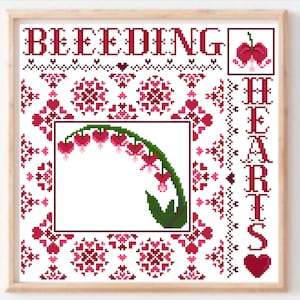 May include: Cross stitch pattern featuring a bleeding heart flower with the text "Bleeding Hearts" and a small heart at the bottom right corner.