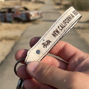 Handcrafted Leather Keychain | Post-Apocalyptic Fallout Style | Personalized White