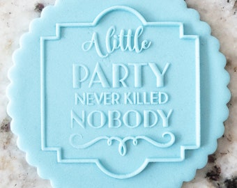 May include: A light blue cookie cutter with a scalloped edge. The cutter is shaped like a sign with the text "A little party never killed nobody" inside.