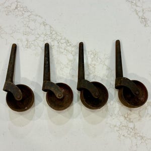 4 Antique Iron Casters with Tapered Stems | 1.75&quot; Diameter | Antique Furniture Wheels