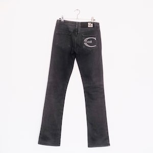 デニム・ジーパン JUST CAVALLI Woman Jeans Black 77PAB501CDWY6 899 23845492_54049935_1000.jpg