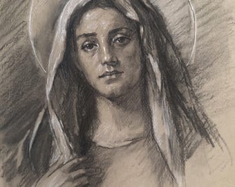 May include: A charcoal and white chalk drawing on tan paper depicting a person with a head covering and a circular halo. The figure has a somber expression, with dark shading defining the features and fabric folds. Signed J. Haffeld '26.