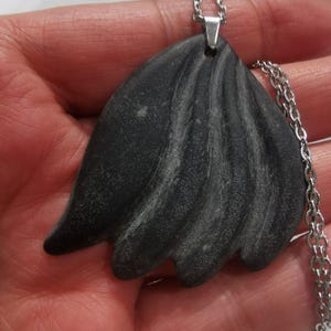Handcarved black stone pendant with stainless steel chain necklace