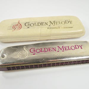 M Hohner Germany Golden Melody Tremolo Harmonica Key Of C Major Silver Metal Burgundy Maroon Plastic Double Row Mouth Organ 1950's Design