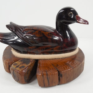 Brown Duck Figurine On Wood Log Artist Signed Hand Crafted Made Duck Decoy Glass Eyes Sculpture Statue Lacquered Natural Wood Slab Rope Trim