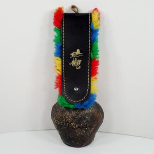 Swiss Swedish Switzerland Cow Bell Brass Tone Metal Hand Crafted Cow Bell Detachable Black Leather Strap Colorful Yarn Trim Gold Embossed