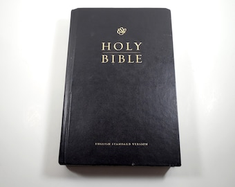 Black Crossway Holy Bible Copyright 2001 English Standard Version Black Hard Cover Embossed Gold Lettering Old And New Testaments 1074 Pages