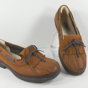 Ugg Australien Kiltie Loafers Oxford Slip On Schuhe Größe 6 EU 37 Camel Braun Tan Leder Kautschuksohlen Gummi 1 Zoll Absatz Sherpa Fell Einlegesohlen