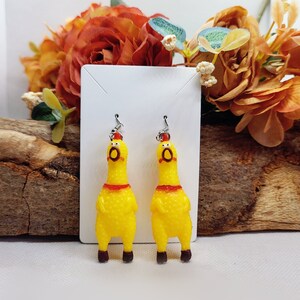 Novelty working rubber screaming squeaky squawking chicken earrings fun gift father Christmas santa claus unique clip on available unique