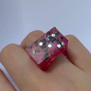 Chunky resin ring- unmixed pink effect with black and silver gems US 6