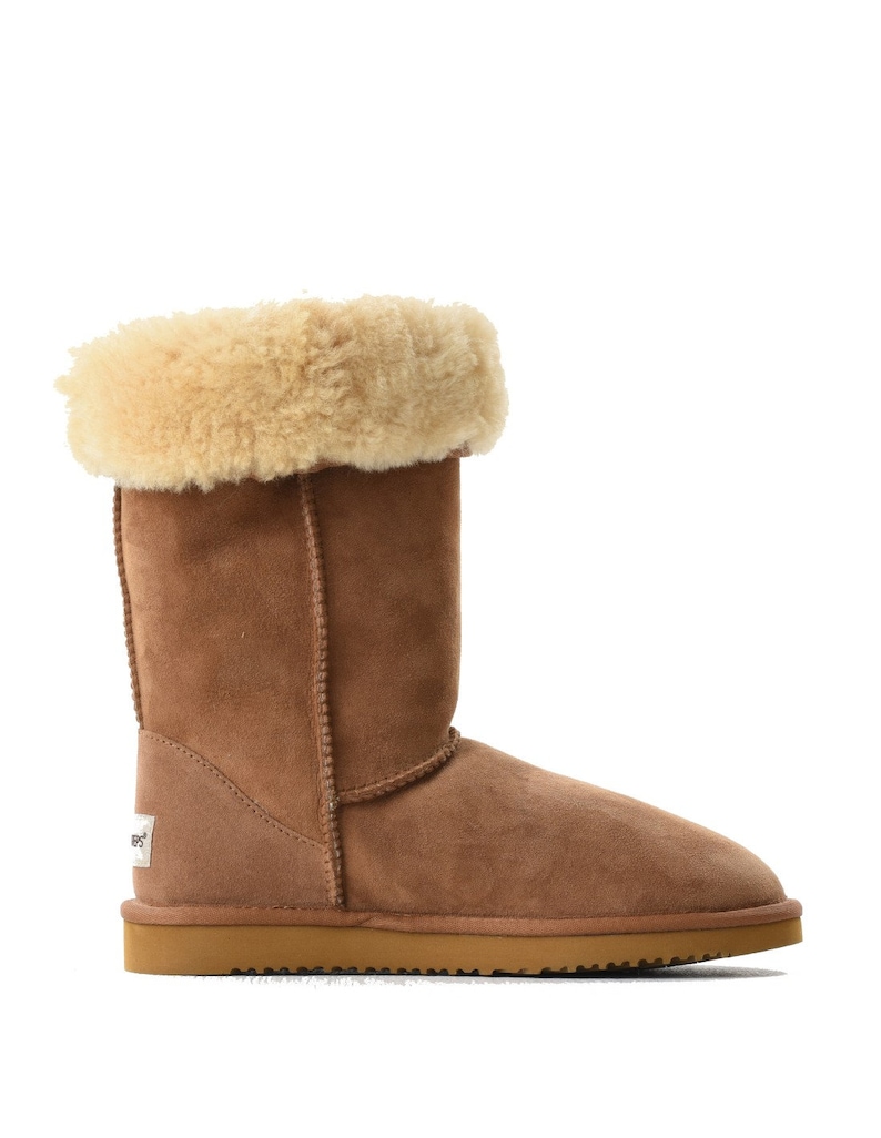 May include: Brown sheepskin boots with a fold-over cuff and a brown suede sole.