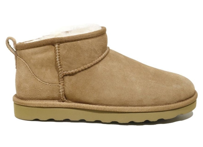 K&ouml;nnte beinhalten: Kn&ouml;chelhohe Stiefel aus braunem Wildleder mit Lammfellfutter und Gummisohle.