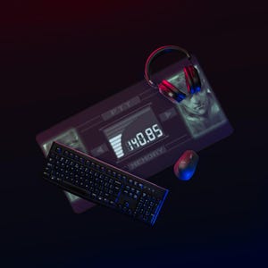 May include: A gaming setup featuring a black keyboard, mouse, and headset. A digital display shows the number 140.85. The setup is illuminated with blue and red lighting against a dark background.