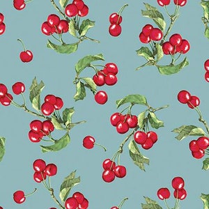 May include: A fabric with a repeating pattern of red cherries and green leaves on branches against a light blue background. The design is a watercolor style, with the text "Riley Blake Designs" at the bottom.