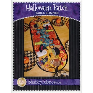 May include: A Halloween Patch table runner with a colorful design featuring pumpkins, ghosts, and an owl. The runner is surrounded by matching decorative plates with pumpkins. The text "Halloween Patch Table Runner" is at the top.