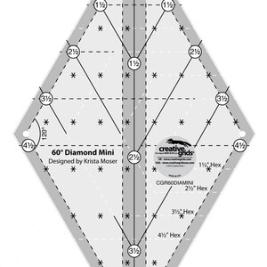 May include: A clear, diamond-shaped quilting ruler with measurements in inches. The ruler has a 60-degree angle and is designed for the 60° Diamond Mini. The text "Creative Grids" and "Made in USA" are visible.