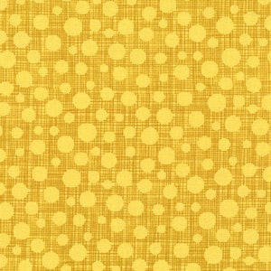 May include: Close-up of a yellow fabric with a repeating pattern of large, light yellow circles. The circles are scattered across a background of fine, intersecting lines in a darker yellow hue, creating a textured effect. The fabric has a warm, inviting appearance.