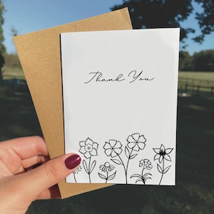 Bloemenbedankkaarten: zwart-wit briefpapier met enveloppen