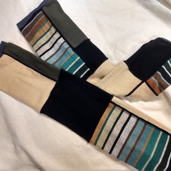 Color blocked, full length  leg warmers. A mix of sweater knit fabrics.