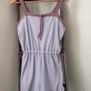 Short warm up romper for dancers.