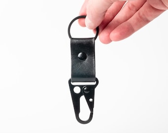 Porte-clés en cuir de vachette noir pleine fleur minimaliste à clip de style HK