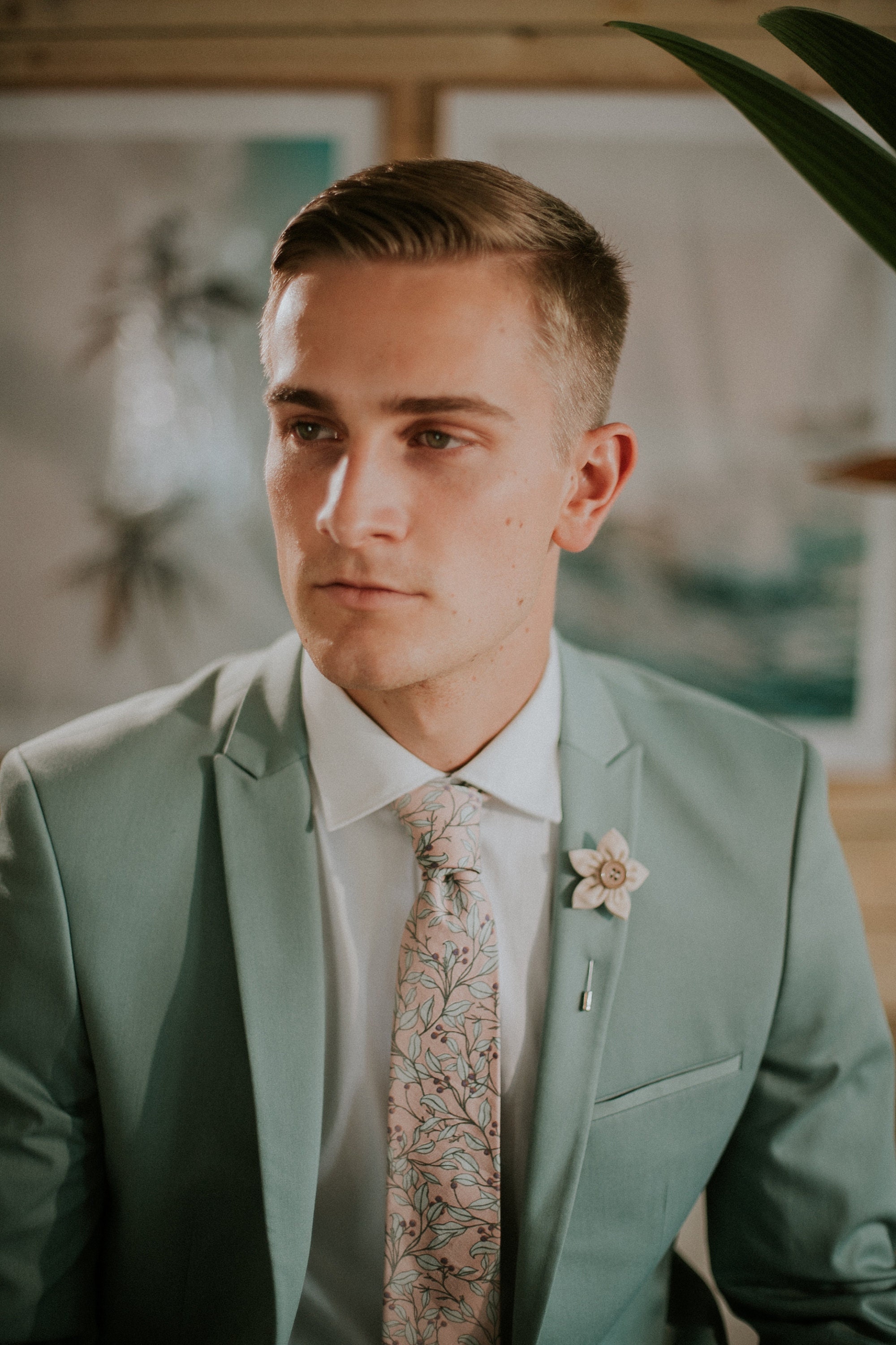 suit with floral tie