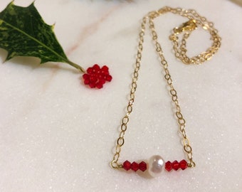 16" 14k gold filled chain necklace featuring red Swarovski crystals and freshwater pearl