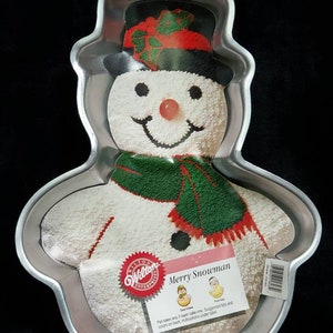 Snowman cake pan bidding ends 1/5 $1.00